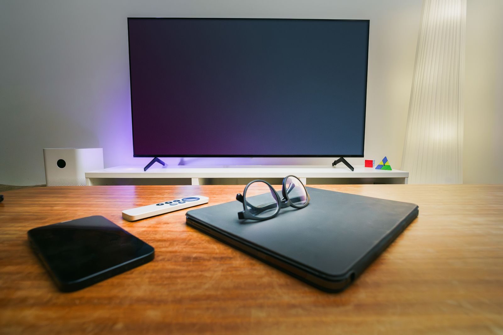 Cozy living room with smart TV devices in Thane